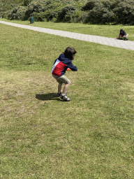 Max throwing a frisbee at the West Repart beach