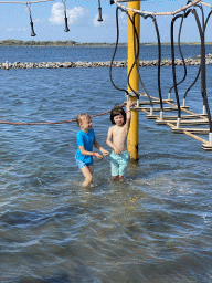 Max and his friend at the Water Playground at the West Repart beach