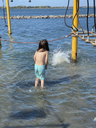 Max and his friend at the Water Playground at the West Repart beach