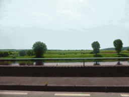 The Moselle river next to the Route du Vin road between Stadtbredimus and Hettermillen, viewed from the car