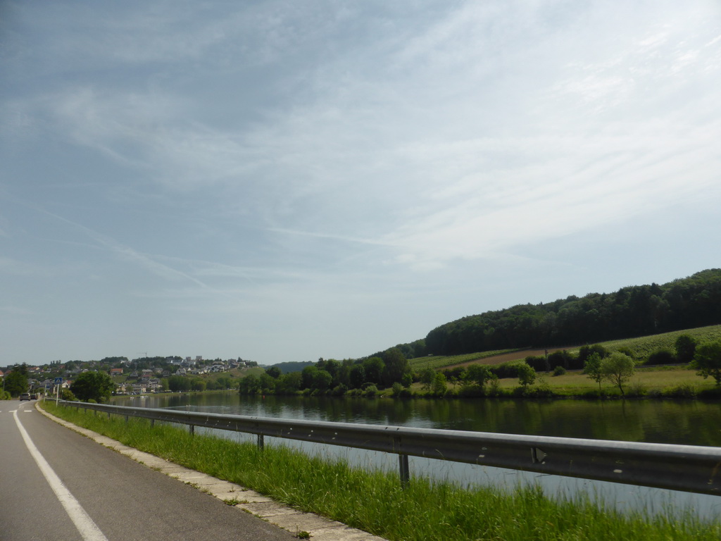 Wine fields, the Moselle river and the village of Ehnen next to the Route du Vin road, viewed from the car