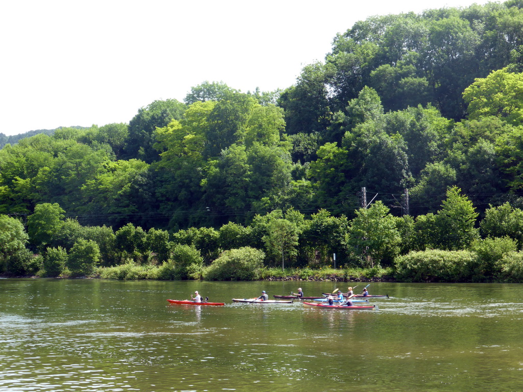 Kanoes in the Moselle river next to the Route du Vin road near Ahn, viewed from the car