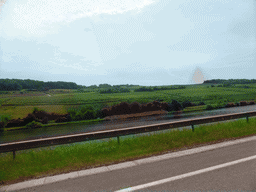 Wine fields and the Moselle river next to the Route du Vin road between Ahn and Nittel, viewed from the car