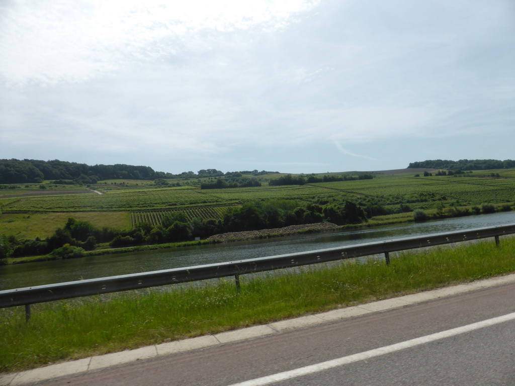 Wine fields and the Moselle river next to the Route du Vin road between Ahn and Nittel, viewed from the car