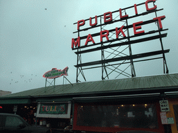 Neon signs on top of Pike Place Market