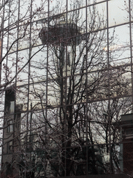 Reflection of the Space Needle in a building at the crossing of Cedar Street and 4th Avenue