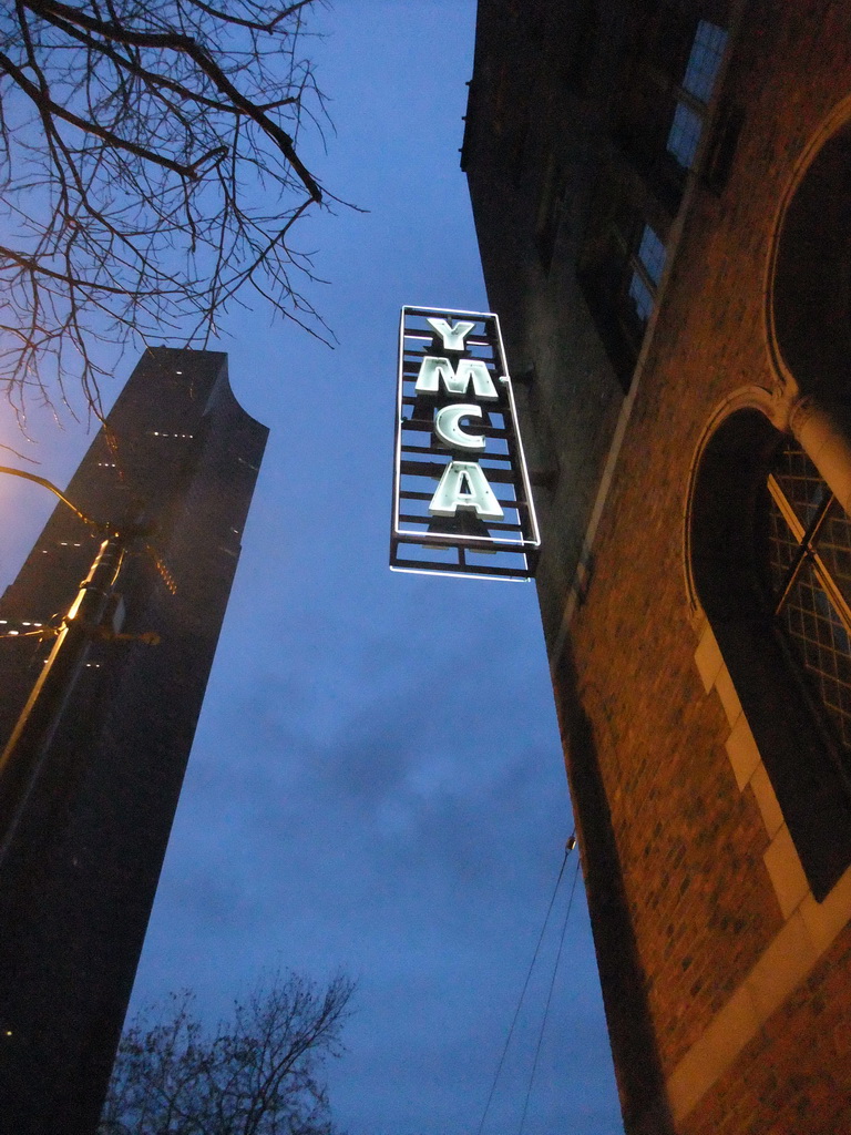 Neon light at the YMCA building, by night