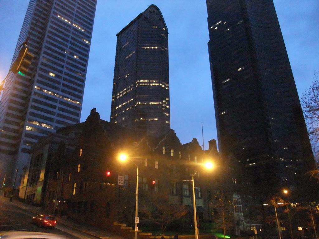 The Rainier Club, the First United Methodist Church, the Bank of America Fifth Avenue Plaza building, the Seattle Municipal Tower and the Columbia Center, by night