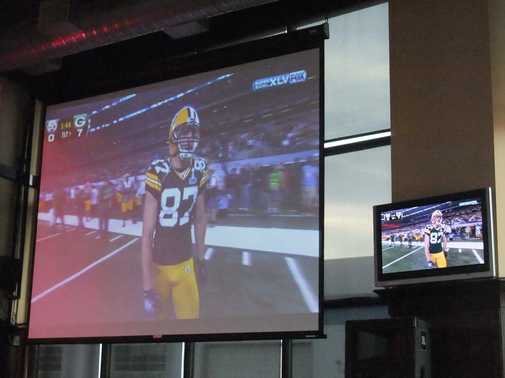 Video screens with Super Bowl XLV at Jillian`s Billiard Club at 9th Avenue North