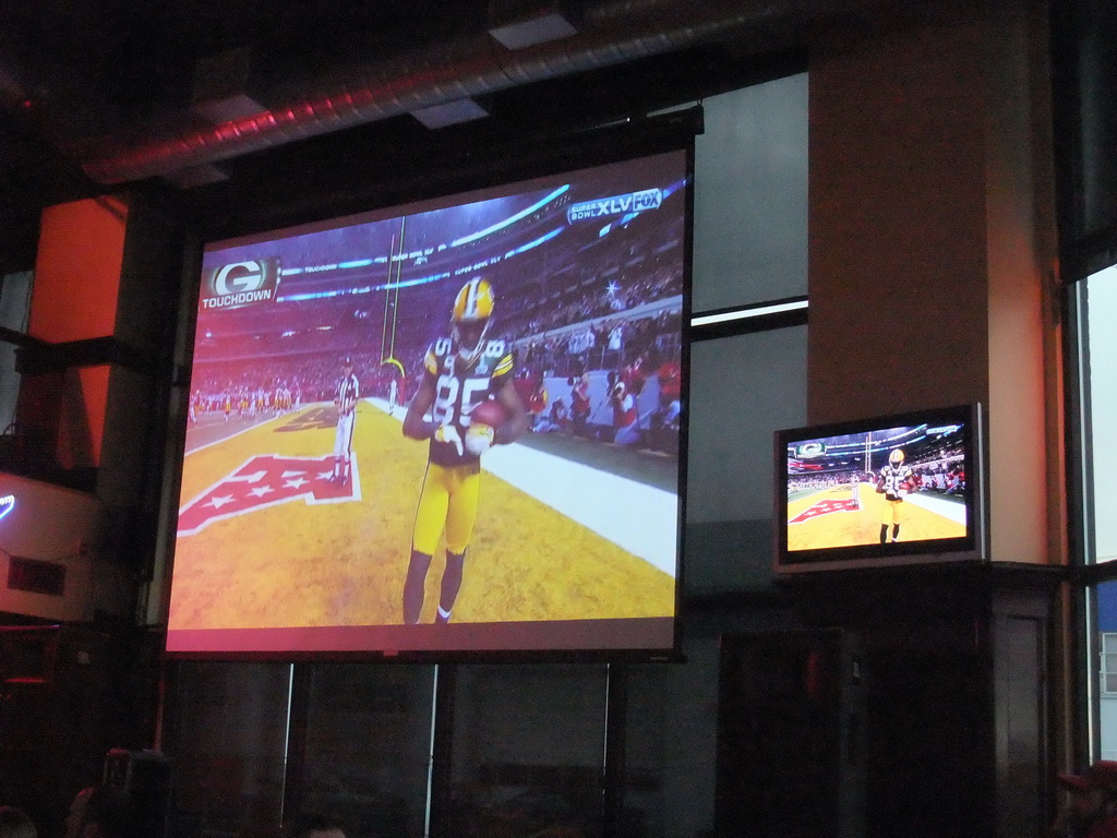 Video screens with Super Bowl XLV at Jillian`s Billiard Club at 9th Avenue North