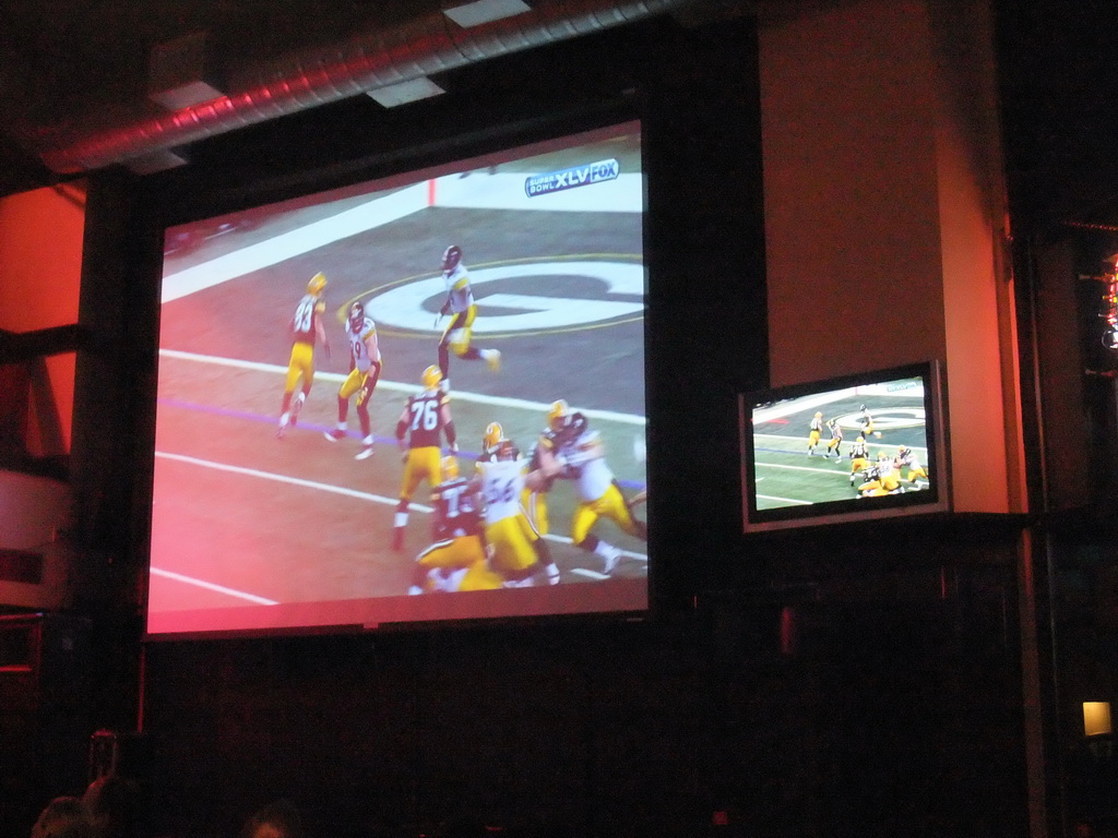 Video screens with Super Bowl XLV at Jillian`s Billiard Club at 9th Avenue North