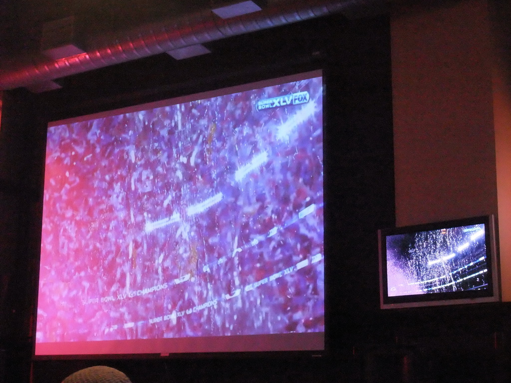 Video screens with Super Bowl XLV at Jillian`s Billiard Club at 9th Avenue North
