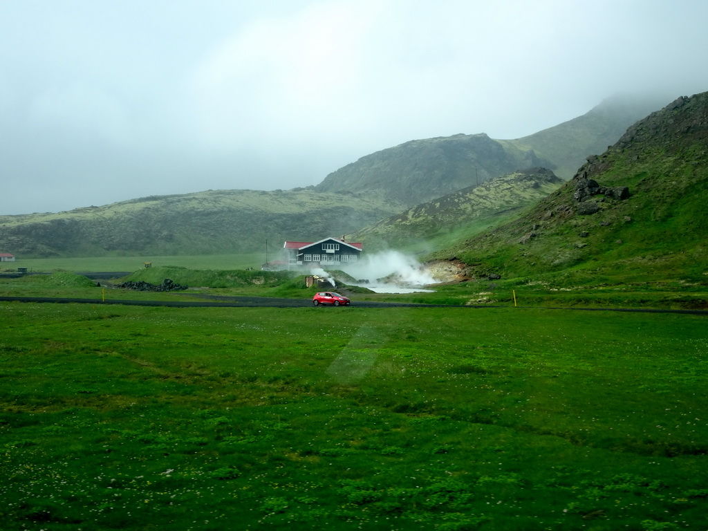 The Hellisheiði Power Station, viewed from the rental car on the Þjóðvegur road