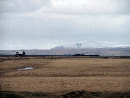 House and mountains near the Seljalandsfoss waterfall