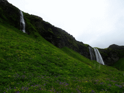 The Seljalandsfoss waterfall and a smaller waterfall at the north side