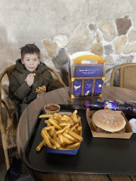 Max having lunch at the terrace of the Waldstub restaurant at the Wunderwald section at the Toverland theme park