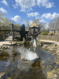 Pond with the Dwervel Djangu and bridges at the waiting line for the Djengu River attraction at the Magische Vallei section at the Toverland theme park