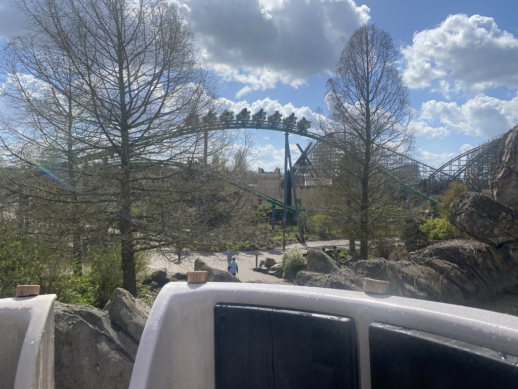 The Booster Bike attraction at the Magische Vallei section and the Scorpios and Troy attractions at the Ithaka section at the Toverland theme park, viewed from our boat at the Djengu River attraction