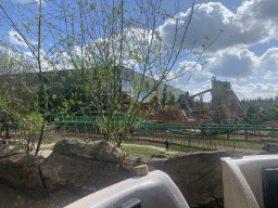 The Booster Bike attraction at the Magische Vallei section and the Maximus` Wunderball and Expedition Zork attractions at the Wunderwald section at the Toverland theme park, viewed from our boat at the Djengu River attraction