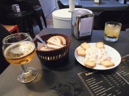 Tapas and drinks at a restaurant in the Calle Archeros street