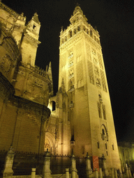 The east side of the Seville Cathedral with the Giralda tower, by night