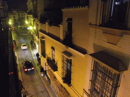 View on the Calle San José street and the Calle Santa Maria la Blanca street from the balcony of our room in Hotel Fernando III, by night