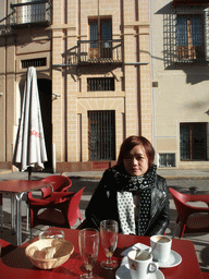 Miaomiao at the terrace of the restaurant `Carmela` in the Calle Santa Maria la Blanca street