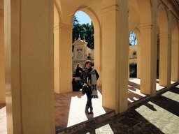 Miaomiao at the gate to the Jardín de las Flores garden at the Alcázar of Seville