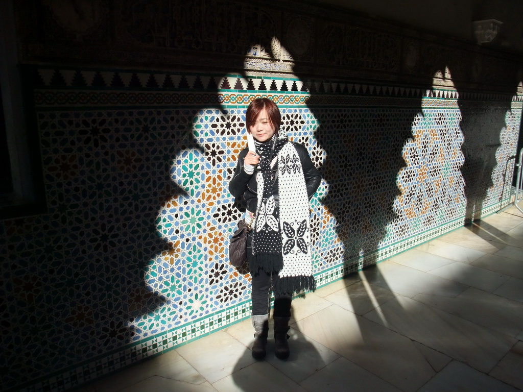 Miaomiao at a mosaic wall at the Patio de las Doncellas at the Palace of King Peter I at the Alcázar of Seville