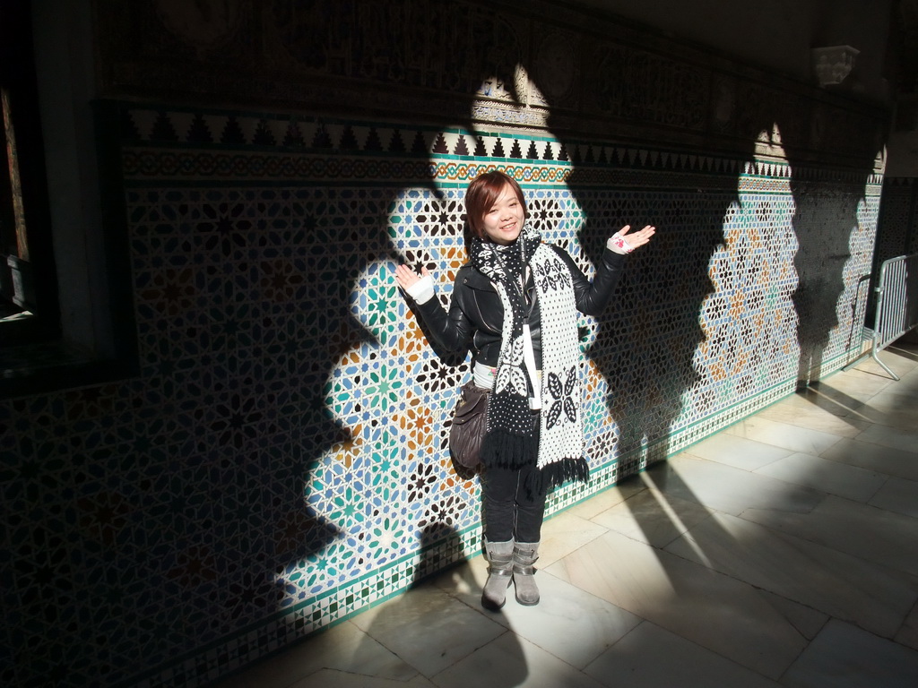 Miaomiao at a mosaic wall at the Patio de las Doncellas at the Palace of King Peter I at the Alcázar of Seville
