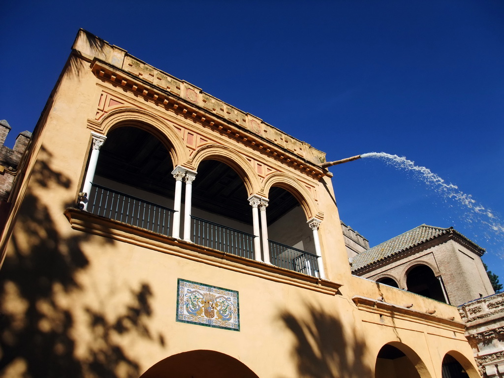 The Palacio Gótico, viewed from the Estanque de Mercurio pond at the Gardens of the Alcázar of Seville