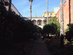 Fountain and orange trees at the Jardín del Chorrón garden at the Alcázar of Seville