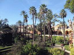 The Gardens of the Alcázar of Seville, the Palacio Gótico and the Giralda tower, viewed from the Galeria del Grutesco gallery