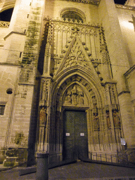 West entrance gate of the Seville Cathedral, by night