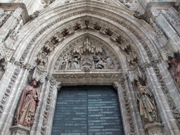 Puerta de San Miguel gate at the west side of the Seville Cathedral