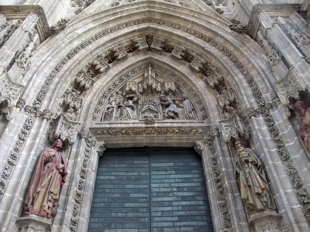 Puerta de San Miguel gate at the west side of the Seville Cathedral