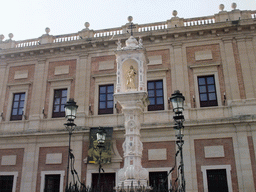 The Triunfo monument and the Archivo General de Indias at the Plaza del Triunfo square