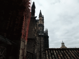 The roof of the Seville Cathedral and the dome of the Iglesia del Sagrario church, viewed from the ramp in the Giralda tower