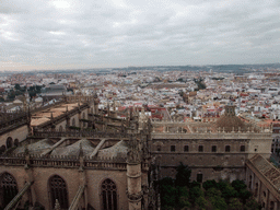 The roof of the Seville Cathedral and the Plaza de Toros de la Real Maestranza de Caballería de Sevilla bullring, viewed from the top of the Giralda tower