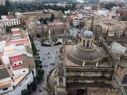 The roof of the Seville Cathedral, the Monument of the Immaculate Conception at the Plaza del Triunfo square, the Alcázar of Seville, the Patio de las Banderas courtyard and the Archivo General de Indias, viewed from the top of the Giralda tower