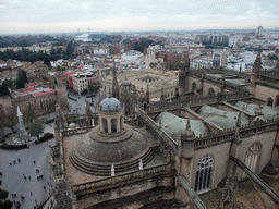 The roof of the Seville Cathedral, the Monument of the Immaculate Conception at the Plaza del Triunfo square, the Alcázar of Seville and the Archivo General de Indias, viewed from the top of the Giralda tower