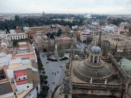 The roof of the Seville Cathedral, the Monument of the Immaculate Conception at the Plaza del Triunfo square, the Alcázar of Seville, the Patio de las Banderas courtyard and the Archivo General de Indias, viewed from the top of the Giralda tower