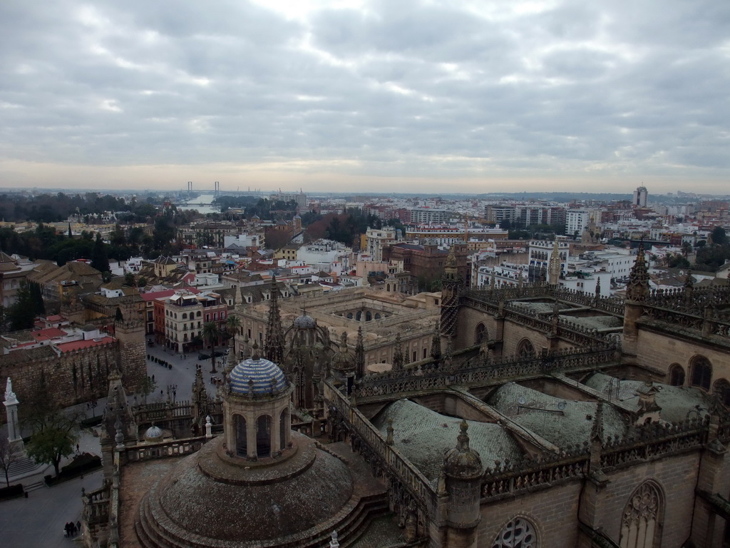 The roof of the Seville Cathedral, the Monument of the Immaculate Conception at the Plaza del Triunfo square, the Alcázar of Seville and the Archivo General de Indias, viewed from the top of the Giralda tower