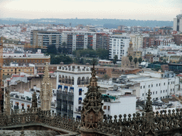 The roof of the Seville Cathedral and the Torre del Oro, viewed from the top of the Giralda tower