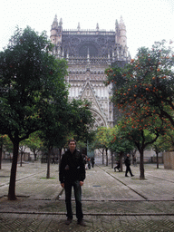 Tim at the east side of the Seville Cathedral with the Puerta de la Concepción gate and orange trees at the Patio de los Naranjos courtyard