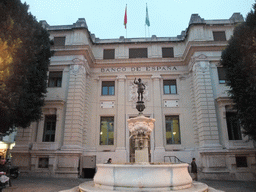 The front of the Banco de España building with a fountain at the Plaza de San Francisco square