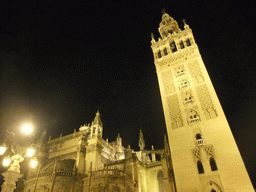 The east side of the Seville Cathedral with the Giralda tower, by night