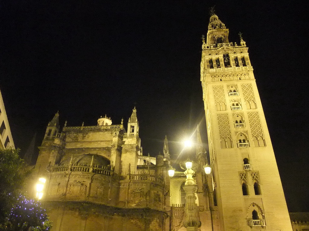 The east side of the Seville Cathedral with the Giralda tower, by night