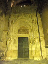 The Puerta de Campanillas gate at the east side of the Seville Cathedral, by night