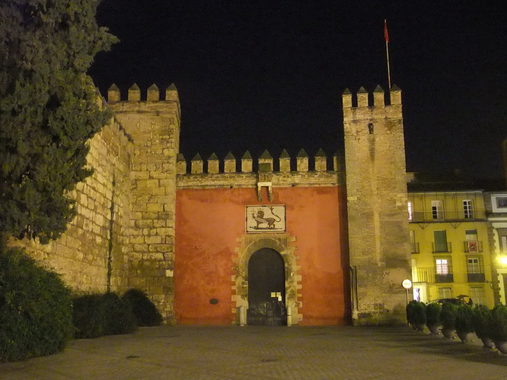 The Lion`s Gate of the Alcázar of Seville, by night